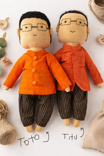 dolls wearing orange shirts and black pants