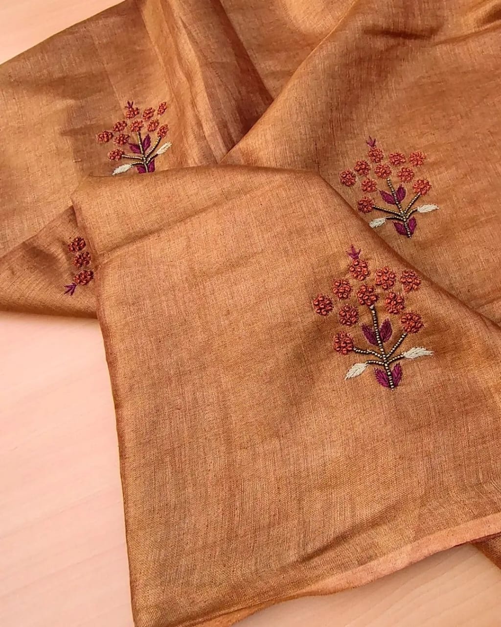 Dusky Orange Soft Tissue Linen Blend Saree with Hand Embroidery